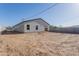 Home with a backyard, dirt and block fence, with a covered patio at 9310 W Washington St, Tolleson, AZ 85353