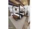 This primary bedroom offers a stylish canopy bed and wood beam ceiling at 9607 E Mckellips Rd, Mesa, AZ 85207