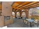 Covered patio with seating and a dining area featuring views of the desert landscape at 9607 E Mckellips Rd, Mesa, AZ 85207