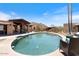 Beautiful pool surrounded by lush desert landscaping, offering a serene and private outdoor oasis at 9607 E Mckellips Rd, Mesa, AZ 85207