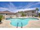 Inviting community pool and spa area with lounge chairs and lush landscaping under a bright blue sky at 9750 N Monterey Dr # 71, Fountain Hills, AZ 85268