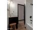 Bathroom showcasing modern fixtures, vanity with a wooden stool and white tile shower at 10849 E Elmwood St St, Mesa, AZ 85207