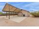 Exterior view of the carport, featuring a large concrete pad at 10849 E Elmwood St St, Mesa, AZ 85207