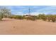 Exterior showcasing desert landscaping and mountain views in the distance at 10849 E Elmwood St St, Mesa, AZ 85207