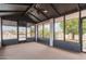 Enclosed patio overlooking backyard pool and landscaping at 10849 E Elmwood St St, Mesa, AZ 85207
