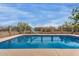 Private backyard pool with slide and beautiful desert landscaping at 10849 E Elmwood St St, Mesa, AZ 85207