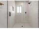 Modern shower features glass door, sleek black fixtures, and subway tile surround at 10849 E Elmwood St St, Mesa, AZ 85207