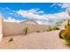 Low-maintenance backyard landscaping offers a desert oasis, blending seamlessly with the natural surroundings at 11807 E Clinton St, Scottsdale, AZ 85259