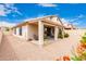 Spacious backyard with a covered patio, perfect for outdoor entertaining and relaxation at 11807 E Clinton St, Scottsdale, AZ 85259
