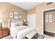 Bright bedroom with cozy bed, stylish decor, and ample natural light at 11807 E Clinton St, Scottsdale, AZ 85259