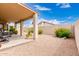 Enjoy outdoor living on this home's covered patio, offering shade and space for relaxing and entertaining at 11807 E Clinton St, Scottsdale, AZ 85259
