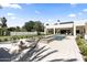 Expansive backyard featuring a swimming pool, spa, patio seating area, and lush greenery at 12240 N 98Th St, Scottsdale, AZ 85260