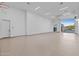 Spacious garage with plenty of room for vehicles, storage and projects at 12240 N 98Th St, Scottsdale, AZ 85260