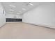Spacious garage with a basketball court and ample open space for versatile use at 12240 N 98Th St, Scottsdale, AZ 85260