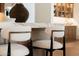 Kitchen bar featuring modern seating with a stone countertop, ideal for casual dining at 12240 N 98Th St, Scottsdale, AZ 85260