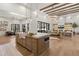 Bright, open kitchen featuring marble island, hardwood floors, and seamless flow to the living area at 12240 N 98Th St, Scottsdale, AZ 85260