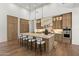 Gourmet kitchen featuring marble countertops, custom cabinetry, and stainless steel appliances at 12240 N 98Th St, Scottsdale, AZ 85260