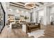 Spacious living room featuring high ceilings, wood beams, hardwood floors and refined details at 12240 N 98Th St, Scottsdale, AZ 85260