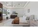 Bright main bedroom with tray ceiling, stylish furniture, and decorative rug at 12240 N 98Th St, Scottsdale, AZ 85260