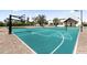 Multi-sport court with basketball, volleyball and shuffleboard creates a fun and active lifestyle at 12240 N 98Th St, Scottsdale, AZ 85260