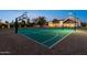 This amazing lit sport court includes shuffle board, hop scotch, tennis, and basketball with professional surfacing at 12240 N 98Th St, Scottsdale, AZ 85260
