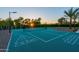 This amazing lit sport court includes shuffle board, hop scotch, tennis, and basketball with professional surfacing at 12240 N 98Th St, Scottsdale, AZ 85260