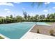 Outdoor sport court featuring a basketball hoop, tennis net, and vibrant playing surface at 12240 N 98Th St, Scottsdale, AZ 85260
