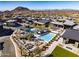 Stunning aerial view showcasing community pools, amenities, and beautiful desert surroundings at 12311 E Black Rock Rd, Scottsdale, AZ 85255