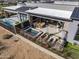 Lush backyard with a pool, spa, and outdoor dining area, ideal for relaxing and entertaining at 12311 E Black Rock Rd, Scottsdale, AZ 85255