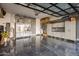 Well-organized garage with epoxy floors, overhead storage, and cabinets for tools and equipment at 12311 E Black Rock Rd, Scottsdale, AZ 85255