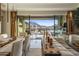 Inviting living room with elegant furnishings and scenic views of the outdoor patio and mountains at 12311 E Black Rock Rd, Scottsdale, AZ 85255