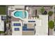 Aerial view of home featuring a pool, large patio, solar panels, and a covered parking area at 1285 E Mcmurray Blvd, Casa Grande, AZ 85122