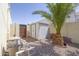 View of backyard shed, mature palm tree and pool equipment at 1285 E Mcmurray Blvd, Casa Grande, AZ 85122