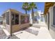 Outdoor view of a pool house and walkway leading to the main house at 1285 E Mcmurray Blvd, Casa Grande, AZ 85122