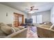 Inviting living room features a ceiling fan, tile flooring, and comfortable seating at 1285 E Mcmurray Blvd, Casa Grande, AZ 85122