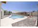 Outdoor pool surrounded by a patio with lounge chairs and umbrellas at 1285 E Mcmurray Blvd, Casa Grande, AZ 85122