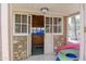 Pool house with a stone facade and hot tub inside at 1285 E Mcmurray Blvd, Casa Grande, AZ 85122