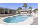 Backyard swimming pool featuring a diving board and adjacent seating area at 1285 E Mcmurray Blvd, Casa Grande, AZ 85122