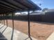 Spacious backyard featuring gravel ground cover with a covered patio at 1452 E Emerald Ave, Mesa, AZ 85204