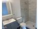 Nicely updated bathroom with modern fixtures and tiled walk-in shower at 1452 E Emerald Ave, Mesa, AZ 85204