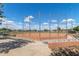 Baseball field features fencing, benches and a well-maintained dirt infield at 15469 W Dreyfus St, Surprise, AZ 85379