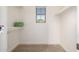 Bright walk-in closet with shelving and carpet at 15469 W Dreyfus St, Surprise, AZ 85379