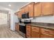 Kitchen area features stainless steel appliances, lots of cabinets and countertop space at 15469 W Dreyfus St, Surprise, AZ 85379