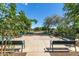 Tranquil outdoor seating area with benches offers a relaxing retreat within the community at 15469 W Dreyfus St, Surprise, AZ 85379