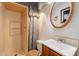Small bathroom with shower, toilet, vanity with mirror, and floral shower curtain at 1654 E 2Nd St, Mesa, AZ 85203