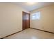 Bedroom with window and closet at 1654 E 2Nd St, Mesa, AZ 85203