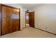 Bedroom featuring wall-to-wall carpet and double closets at 1654 E 2Nd St, Mesa, AZ 85203
