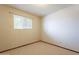 This bedroom offers natural light from its window at 1654 E 2Nd St, Mesa, AZ 85203