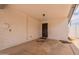 A simple carport features painted walls and a covered ceiling at 1654 E 2Nd St, Mesa, AZ 85203