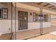 Charming front porch features an ornate security screen door and decorative window accents at 1654 E 2Nd St, Mesa, AZ 85203